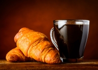 Café-croissant avec le directeur